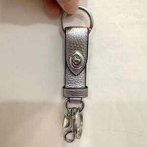 PURCHASED ON ANOTHER SITE DO NOT BUY COACH Metallic AshPebble Leather Keychain